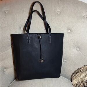 Chic Black Tote Bag with Gold Accents